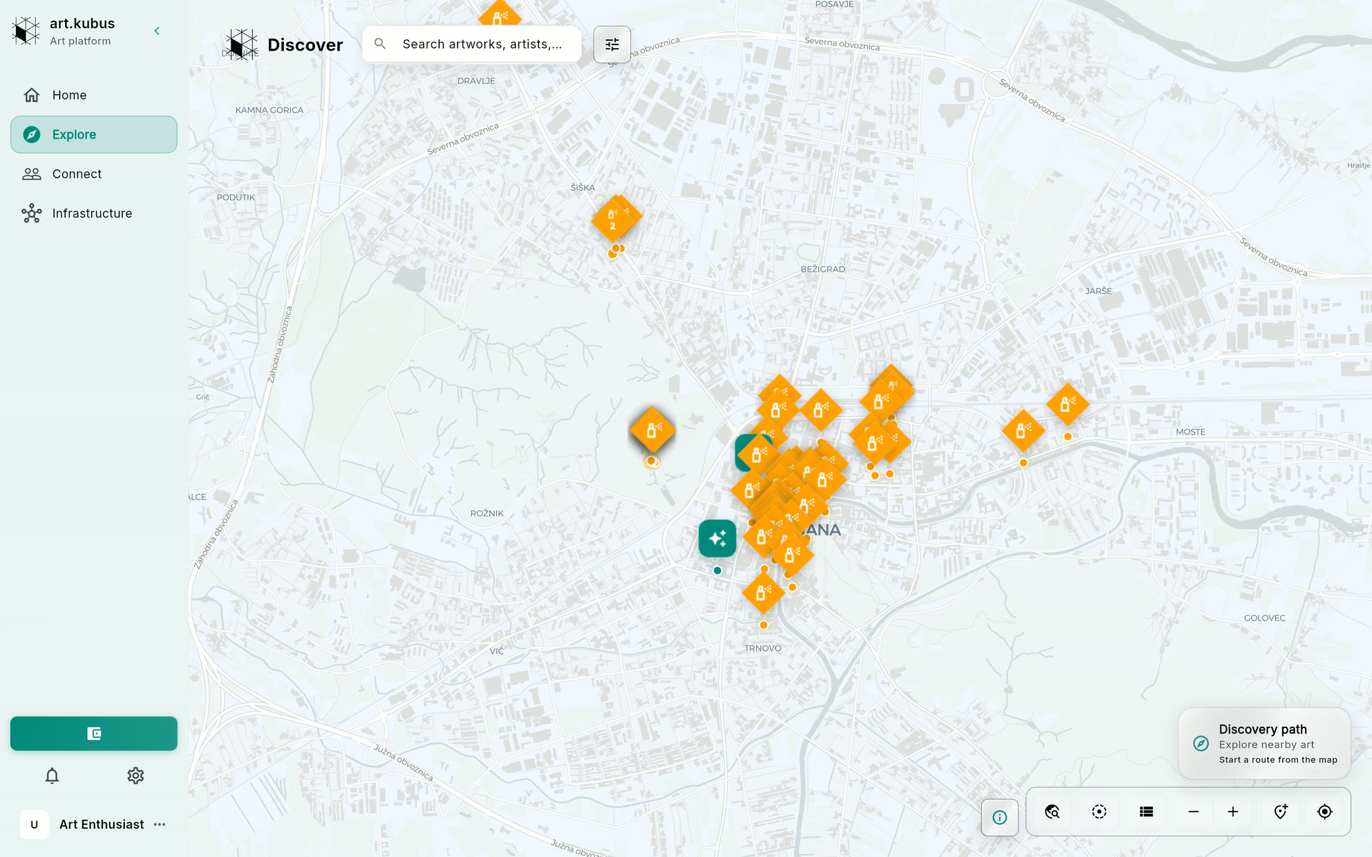 The art.kubus app: a sidebar of Home, Explore, Connect and Infrastructure beside a map of Ljubljana dense with orange artwork markers, a Discover search field, and a Discovery path panel.