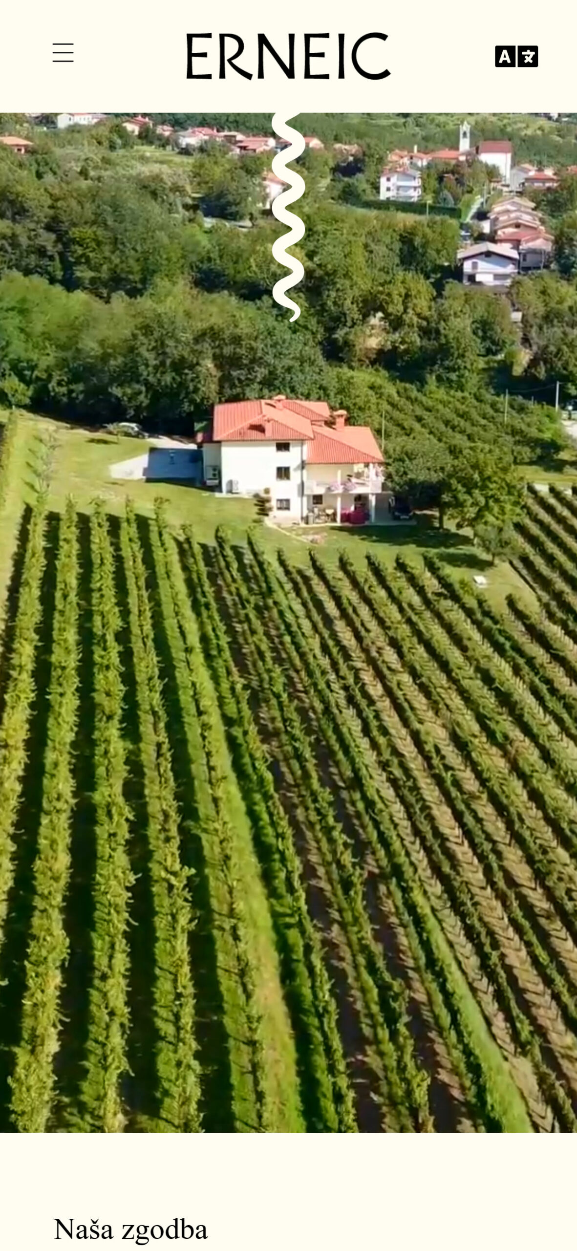 The Erneic site on a phone: the wordmark, the vineyard film, and the beginning of the story section.